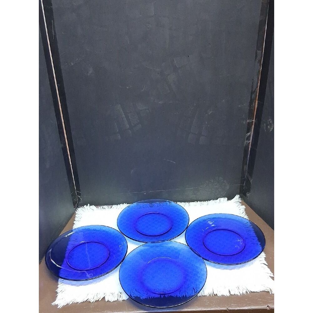 Anchor Hocking, 8" luncheon plates from their "Presence Cobalt‎ Blue" line.